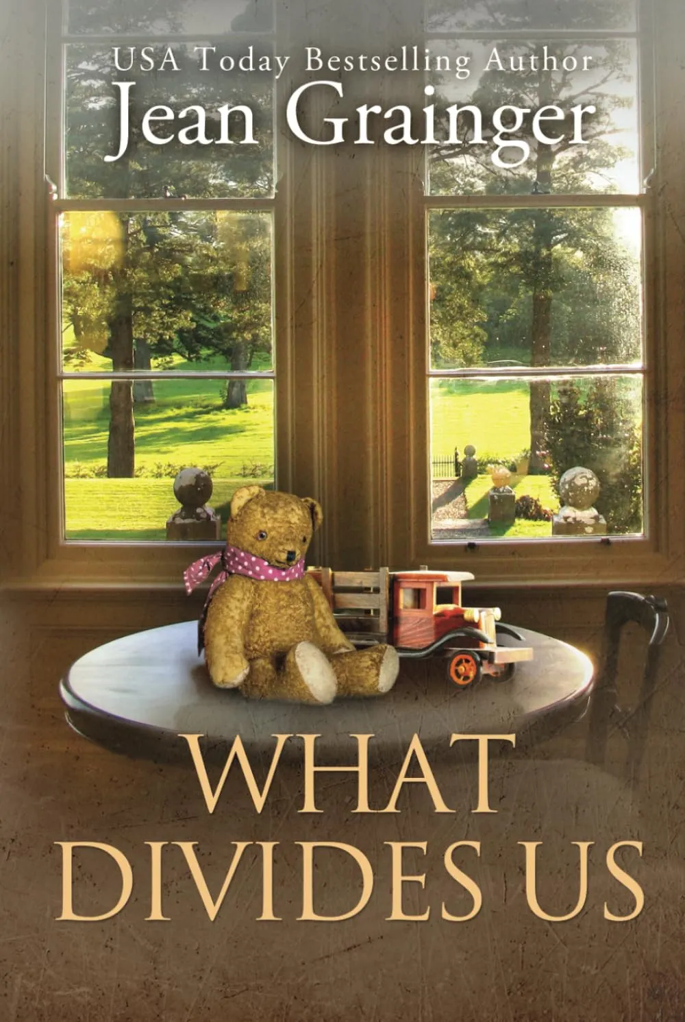 What Divides Us: The Kilteegan Bridge Story - Book 2 Hardcover  September 26, 2022